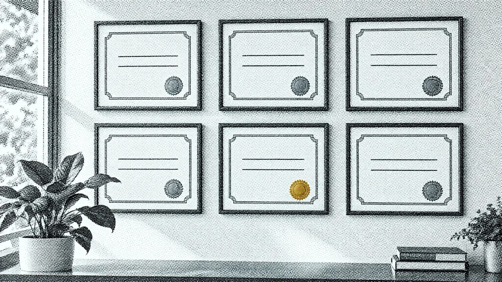 A grid of six framed certificates on a wall, one carrying a gold seal