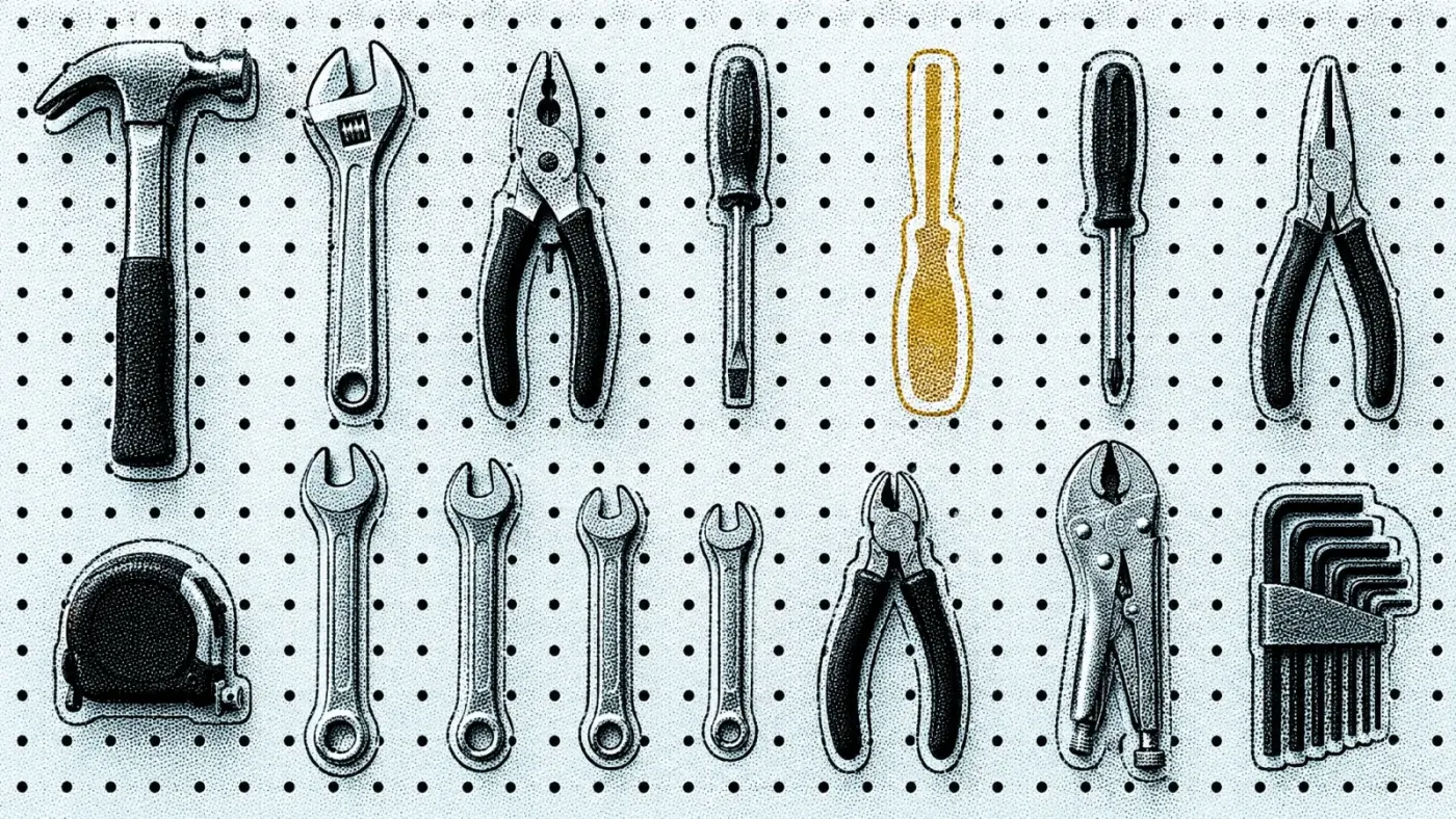 A pegboard of hand tools, each in its own painted outline, with one outline left empty